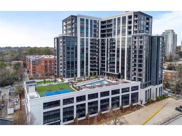 Modern high-rise building with a rooftop pool, tennis court and city views from the roof at 2425 Peachtree Rd # 1806, Atlanta, GA 30305