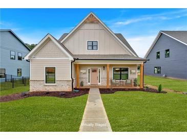 Charming craftsman-style home with a well-manicured lawn and inviting front porch at 133 Old Alabama Se Rd, Emerson, GA 30137