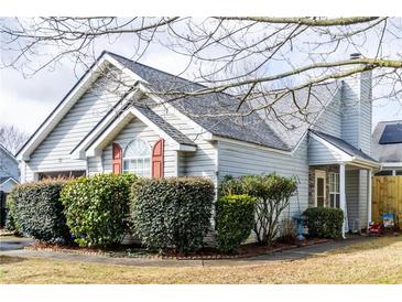 Charming single-Gathering home featuring a well-maintained yard and classic architectural details, creating a welcoming curb appeal at 11 Montclair Ct, Cartersville, GA 30121