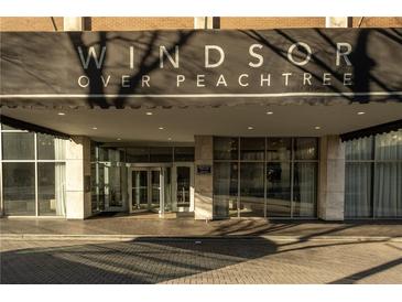 Elegant building entrance featuring Windsor Over Peachtree signage and glass doors at 620 Peachtree Ne St # 502, Atlanta, GA 30308