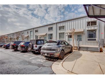 Modern townhome complex featuring private parking, covered entries, and a sleek, contemporary design at 1661 La France Ne St # 216, Atlanta, GA 30307