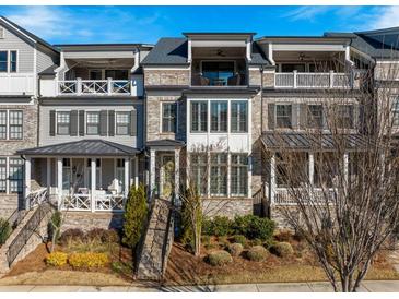 Charming townhome with brick and siding, featuring multiple balconies and well-maintained landscaping at 364 Concord St, Alpharetta, GA 30009