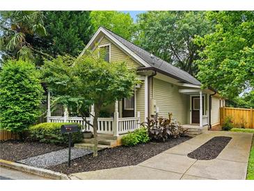 Charming bungalow with a welcoming front porch and well-maintained landscaping at 731 Mollie Se St, Atlanta, GA 30316