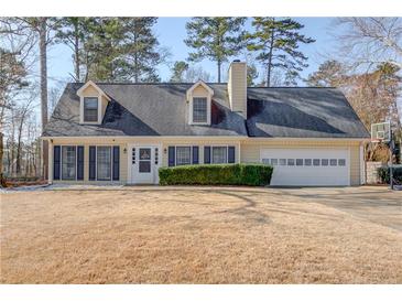 Charming two-story home with a well-maintained front yard and a two-car garage at 4808 Sunview Ct, Suwanee, GA 30024