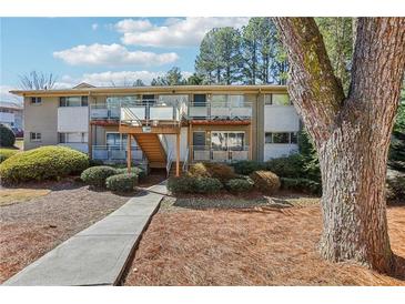 Charming apartment building with well-maintained landscaping and inviting entrance at 3048 Briarcliff Ne Rd # 2, Atlanta, GA 30329