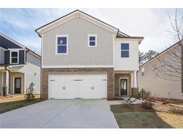 Charming two-story home with stone accents and a spacious two-car garage at 2777 Aralynn Way, College Park, GA 30337