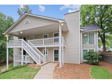 Inviting two-story condo with covered porch and well-maintained landscaping, located in a desirable community at 1905 Countryside Se Pl # 1905, Smyrna, GA 30080