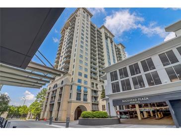Luxury high rise exterior with covered parking and beautiful architecture in a desirable location at 3040 Peachtree Nw Rd # 613, Atlanta, GA 30305