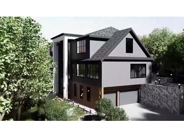 Contemporary two-story home featuring a two-car garage and a combination of modern and traditional design elements at 4250 Carmain Ne Dr, Atlanta, GA 30342