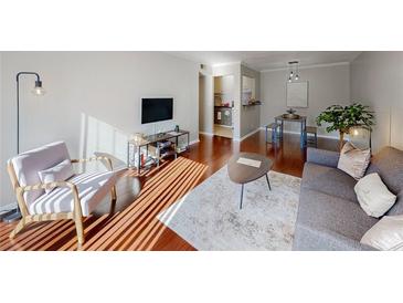 Inviting living room featuring hardwood floors and modern furnishings for a comfortable atmosphere at 1181 Church St # G, Decatur, GA 30030
