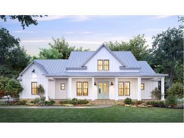 Charming single-story home featuring a welcoming front porch and a beautifully landscaped yard at 3286 Elwin Ragsdale Way, Acworth, GA 30102