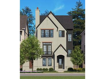 Charming two-story home featuring a mix of neutral siding and a brick chimney, complemented by dark-framed windows at 2305 Park Walke Dr, Alpharetta, GA 30009