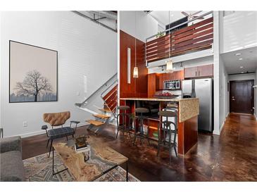 Inviting living area with sleek stairs, stylish decor, and an open design at 964 Dekalb Ne Ave # 112, Atlanta, GA 30307