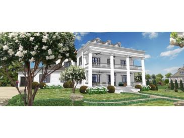 Stately two-story home with a manicured lawn, classic columns, and a charming front porch at 1075 Lancaster Sq, Roswell, GA 30076