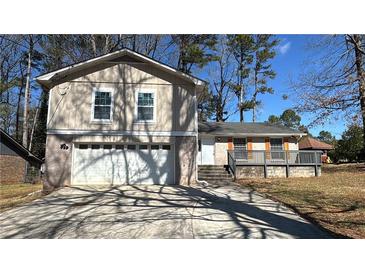 Charming two-story home with attached garage and welcoming front porch at 3924 Veracruz Dr, Decatur, GA 30034