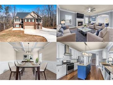 Beautiful two-story home with a brick facade and large driveway surrounded by trees at 5170 Black Bear Trl, Douglasville, GA 30135