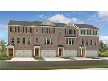 Attractive brick townhome with a single-car garage, complemented by well-maintained landscaping and inviting entrances at 1741 Lansmere Sw St, Marietta, GA 30008