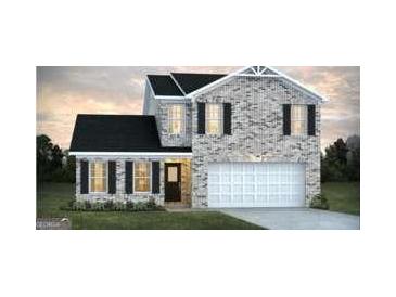 Charming new construction home with brick facade and a two-car garage at 5305 Tolar Rd, South Fulton, GA 30213