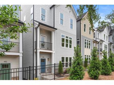 Charming new construction townhomes with modern designs, attractive facades, and small landscaped yards at 484 Hammons Way, Atlanta, GA 30315