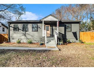 Charming single-Gathering home featuring a welcoming front porch and mature trees at 2178 Penelope Nw St, Atlanta, GA 30314