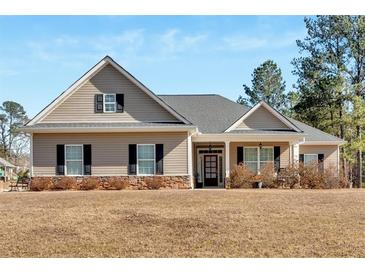 Charming single Gathering home with horizontal siding and traditional design elements at 17 Denny Springs Dr, Dallas, GA 30157