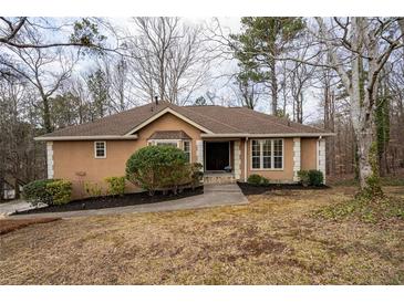 Charming one-story home with a well-maintained lawn and a welcoming entrance at 1285 Glandor Se Ct, Mableton, GA 30126