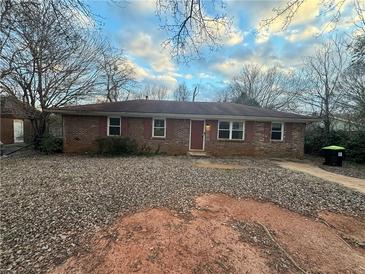Charming brick home featuring a classic design and a well-maintained exterior at 2955 Preston Dr, Rex, GA 30273