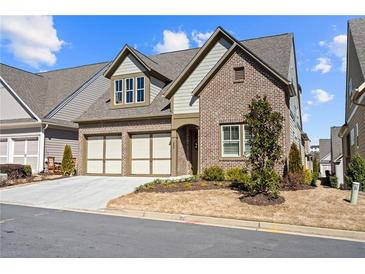 Charming brick home with a two-car garage and inviting curb appeal at 260 Hemphill Ln, Marietta, GA 30064