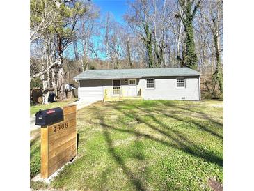 Charming single-story home with a freshly painted exterior and inviting front yard at 2308 Baywood Se Dr, Atlanta, GA 30315