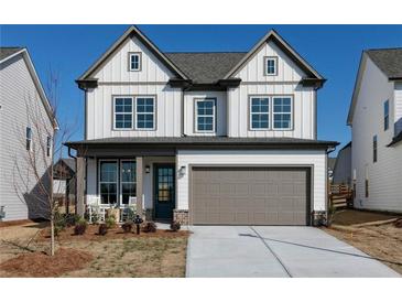Charming two-story home with a neutral palette, inviting curb appeal, and a well-manicured front yard at 600 Belshire Dr, Acworth, GA 30102
