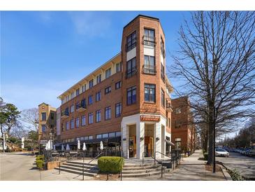 Beautiful brick building with outdoor dining and commercial space in an urban setting at 1418 Dresden Ne Dr # 355, Atlanta, GA 30319