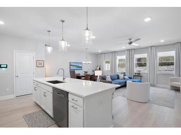Bright open concept living room and kitchen with modern finishes and ample natural light at 3037 Ferrington Way, Smyrna, GA 30080