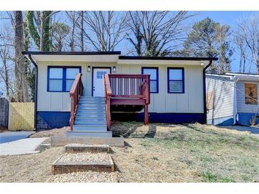 Charming exterior view of home with wooden porch and stairs leading to the front door at 2767 3Rd Sw Ave, Atlanta, GA 30315