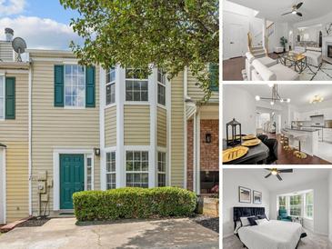 Charming two-story townhouse with green shutters, a manicured hedge, and a welcoming teal front door at 112 Timber Mist Ln, Lawrenceville, GA 30045