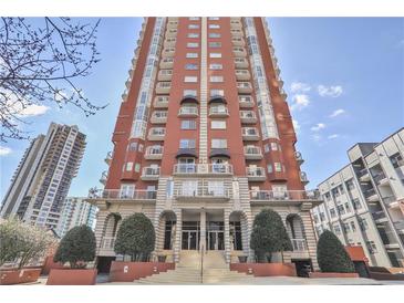 Low angle of a red brick high-rise building featuring repeating balconies on upper levels at 3435 Kingsboro Ne Rd # 1701, Atlanta, GA 30326
