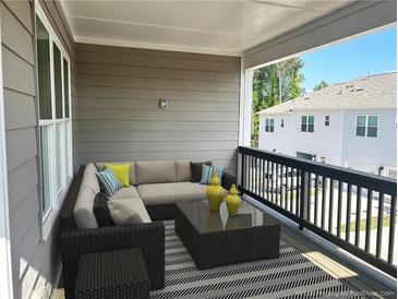 Relaxing patio with comfortable seating and a view of the surrounding neighborhood at 1915 Cassia Aly, Kennesaw, GA 30144