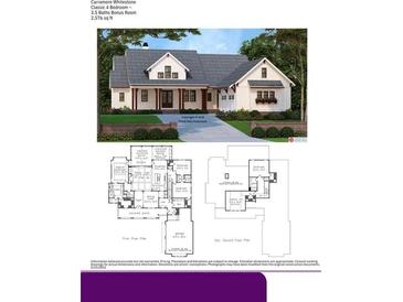 Charming traditional home featuring a well-manicured lawn and a welcoming front porch at 7404 Big Creek Dr, Douglasville, GA 30135