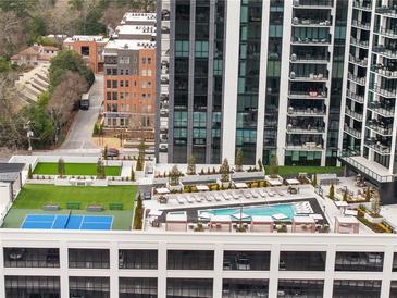 Stunning rooftop pool and lounge area with city views, perfect for relaxing and entertaining in style at 2425 Peachtree Ne Rd # 1604, Atlanta, GA 30305