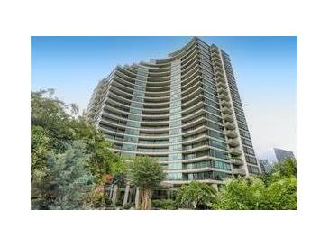 Stunning condominium building featuring a modern design and private balconies overlooking the surrounding landscape at 700 Park Regency Ne Pl # 603, Atlanta, GA 30326