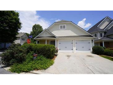 Charming home with a two-car garage and well-maintained landscaping at 536 Highland Falls Dr, Hiram, GA 30141