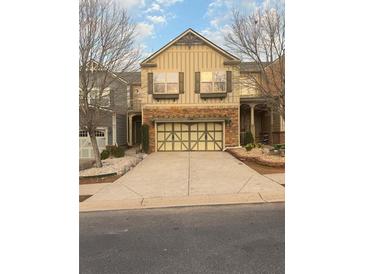 Charming two-story home with a two-car garage and well-maintained landscaping at 2530 Gold Creek Ln, Cumming, GA 30041