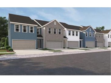 Charming townhome community featuring craftsman-style architecture and attached garages at 1115 Lockhart Way, Douglasville, GA 30135