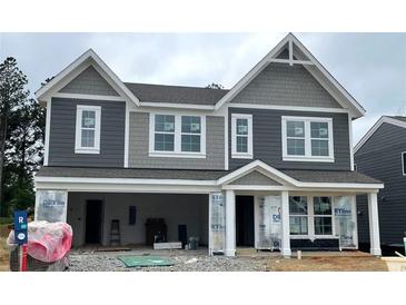 Two-story home featuring gray siding, white trim, and an attached garage at 116 Cherry Glen Way, Euharlee, GA 30145