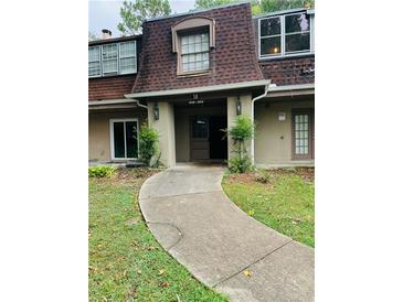 Inviting condo exterior with well-maintained landscaping and visible unit number at 2958 Parc Lorraine, Lithonia, GA 30038