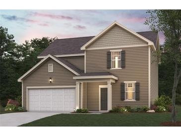 Charming two-story home with a two-car garage and professional landscaping at 7224 Lacey Dr, Douglasville, GA 30134