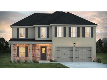 Two-story home with brick and siding, dark shutters, and a two-car garage at 903 Jackson Oak Place, Villa Rica, GA 30180