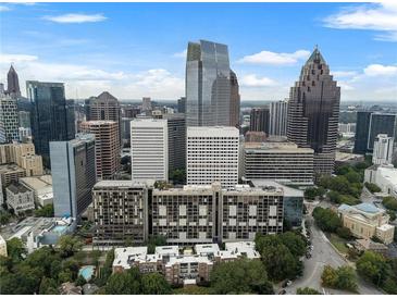 Stunning aerial view of condominium building amidst the vibrant Atlanta skyline, a luxurious city living experience at 145 15Th Ne St # 843, Atlanta, GA 30309