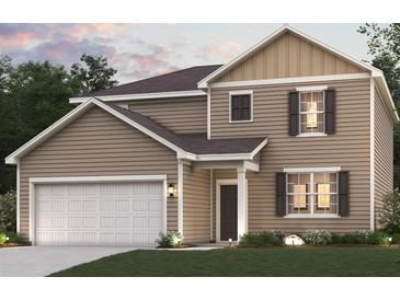 Charming two-story home with neutral siding, attached two-car garage, and well-manicured lawn at 8523 Poston Place Lot 132, Douglasville, GA 30134