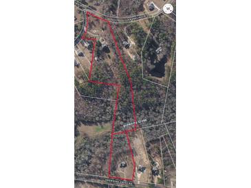 Large lot on Drowning Creek with mature trees and creek access at 1603 Drowning Creek Rd, Dacula, GA 30019