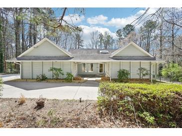 Charming single story home with a large front yard and ample parking space at 4859 Clark Lake Nw Way, Acworth, GA 30102